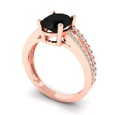 a rose gold engagement ring with an oval black diamond