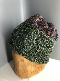 "This hand knit beanie hat was designed and knit by me. Great for winter sports, shoveling snow or just to be trendy. It is made from a soft fun yarn is 100% wool, so it will require hand washing and air drying, but well worth the extra trouble. Hat is size large for heads 20-22\"." Casual Knitted Hats For Winter Sports, Outdoor Knitted Hat One Size, Outdoor Knitted One-size Beanie, Outdoor Knit Crochet Cap, One Size Outdoor Knitted Hat, One Size Knitted Outdoor Hat, Outdoor Knit Beanie One Size Fits Most, Outdoor Knitted Beanie, Outdoor Acrylic Yarn Beanie One Size