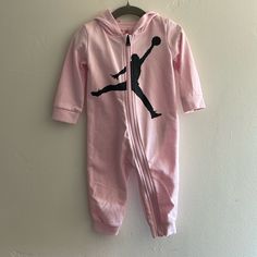 Jordan Jumpman Hooded Coverall 12m Never Worn Ribbed Cuffs Offer Secure Fit Full Length Zipper (With Chin Guard) Enables Easy Changing Pink Long Sleeve Onesie For Playwear, Long Sleeve Pink Onesie For Playwear, Casual Pink Onesie For Playtime, Casual Pink Hooded Onesie, Pink Winter Onesie For Playtime, Casual Pink Onesie For Winter, Winter Pink Onesie For Playtime, Winter Playwear For Babies In Pink, Casual Winter Pink Onesie