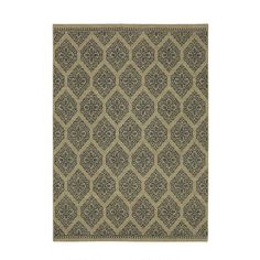 a rug with an intricate design on the front and back side, in beige and black