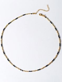 Experience the exquisite beauty of our handcrafted Black Spinel Gold Bean Mini Bead Necklace. Each element is carefully handcrafted to create a refined, elegant look. Add a touch of sophistication to any outfit with this versatile and glamorous necklace. Metal: 18ct Recycled Gold Plated On Brass Gemstone:Black Spinel Pearl: Freshwater Pearl 2.5mm Length: 400-450mm Weight: 5g Black Spinel Necklace, Black Spinel, Recycled Gold, Bead Necklace, Freshwater Pearls, High Fashion, 18k Gold, Gold Plate, Beaded Necklace