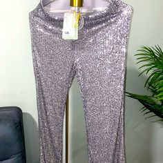 H&M Brand New Sequin Pants Perfect Condition All Pictures & Videos Are An Accurate Representation Of The Item. Please Thoroughly Examine All Pictures And Videos Prior To Purchasing :) Silver Shiny Disco Bottoms, Shiny Silver Disco Bottoms, Disco Silver Shiny Bottoms, Elegant Silver Sequined Pants, Silver Sequined Pants For Night Out, Silver Wide Leg Bottoms With Sequins, Silver Sequined Wide Leg Bottoms, Silver Sequined Bottoms For Night Out, Glamorous Silver Full-length Pants