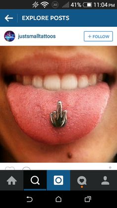 an open mouth with pink lipstick on it