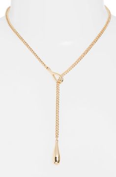 "Find NORDSTROM Droplet Curb Chain Lariat Necklace on Editorialist. A polished teardrop brings focal shine to an elegant lariat necklace composed of gleaming curb-chain links. 16\" length Goldtone plate Imported"