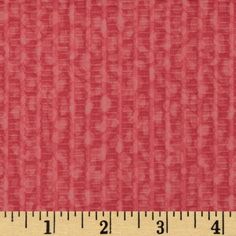 a ruler with a brown fabric on it