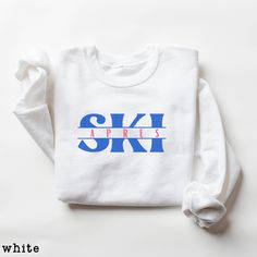 Cute and Cozy Après Ski Sweatshirt- Unisex sizing: Great for men or women! All sweashirt colors come with the blue/pink design,  except for the navy navy sweatshirt, which comes with green/yellow design. Message me BEFORE ordering for custom color combinations. Great for group destinations, skiing trips, family vacation, girls weekend, guys mountain getaway, bachelorette parties- the opportunities are endless! Cute Ski Crewneck Sweatshirt! Durable polyester and cotton blend for long-lasting wear Sporty Crew Neck Top For Ski Season, Casual Tops For Winter Sports, Sporty Crew Neck Skiing Tops, White Crew Neck Sweatshirt For Winter Sports, Sporty Crew Neck Tops For Skiing, Casual Skiing Tops, Casual Winter Skiing Tops, Long Sleeve Ski Tops For Ski Season, Long Sleeve Skiing Tops For Ski Season