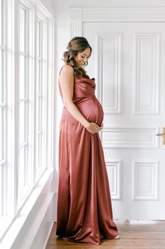 Our popular Skye satin dress is now available in maternity. This classic slip dress is perfect for the mommy-to-be with a higher waistline and pleats in the front to accommodate a baby bump. You'll feel comfortable yet elegant all night!