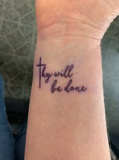 a wrist tattoo that says, thy will be done