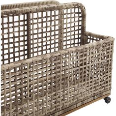 a basket with wheels on the side