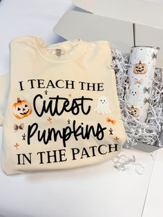 🎃 Perfect Teacher Boo Box 🎃 Show off your teacher spirit this fall with our adorable "I Teach the Cutest Pumpkins in the Patch" Boo Box. This charming bundle includes a super-soft Comfort Colors t-shirt featuring playful Halloween designs with cute ghosts and pumpkins, plus a matching insulated tumbler. The cream-colored shirt pairs perfectly with any outfit, making it ideal for those busy school days leading up to Halloween. Includes:• Cozy cream t-shirt• Coordinating insulated tumbler• Both featuring adorable Halloween designs The perfect gift for any educator who loves bringing seasonal fun to their classroom!​​​​​​​​​​​​​​​​ Personalized Treat Bags, Ghosts And Pumpkins, Cream T Shirt, Cute Ghosts, Cuddle Blanket, Halloween Designs, Outfit Making, Sports Mom, Cute Pumpkin