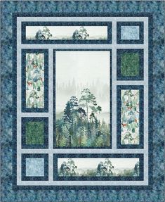 a quilted wall hanging with trees and mountains in the background