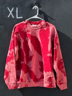 This up-cycled bleached Red crewneck sweatshirt is a must have for any vintage fans. It is hand-dyed, one of a kind, and super super soft. If there is a specific vintage T-shirt/sweatshirt that you are looking for that you have not been able to find please let us know! We would love to help you track it down. This shirt is sized as a ADULT XL - Shirt measurements available upon request ONLY 1 IN STOCK - One of a Kind CARE INSTRUCTIONS Try to avoid bleach and fabric softeners Wash inside out in cold water Tumble dry low or hang dry Use mild detergent All bleach dyes have been pre-washed and pre-shrunk. As these are vintage and up-cycled clothing, there may be some small wear and tear, imperfections have been photographed and listed - Please reach out if there are any concerns with the produ Red Bleached Shirt, Sweat Vintage, Dye Flowers, Tie Dye Crafts, Flower Sweatshirt, Reverse Tie Dye, Red Crewneck, Vintage Fans, Warriors T Shirt