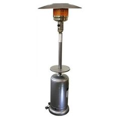 an outdoor patio heater is shown with the light on and it's cover open