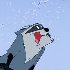 a cartoon character with his mouth open and birds flying in the background