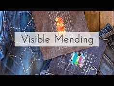 the words visible mending are displayed next to jeans