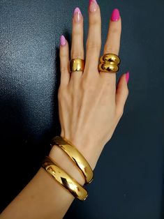 This Statement Rings item by deesseyourstore has 26 favorites from Etsy shoppers. Ships from Brooklyn, NY. Listed on Mar 7, 2024 | Bold jewelry Gold Statement Bracelet, Thick Gold Bracelet, Chunky Gold Rings, Thick Gold Ring, Chunky Gold Bracelet, Jewelry 2024, Chunky Jewellery