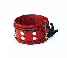 Handmade Leather Wristband For Festival, Handmade Adjustable Red Leather Bracelet, Handmade Red Leather Bracelet, Adjustable Red Leather Bracelet, Red Leather Bracelet For Gift, Red Leather Bracelet As Gift, Red Adjustable Leather Bracelet, Handmade Leather Cuff Wristband, Red Leather Bracelet