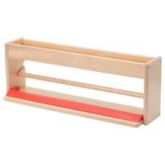 a wooden shelf with red tape on the bottom and two shelves below it for storage