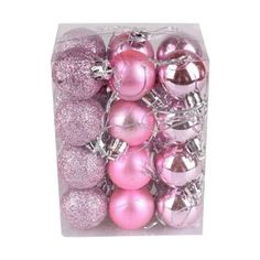 pink and silver ornaments in a clear box