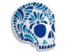 a blue and white sugar skull sticker on a white background with the word sugar skulls