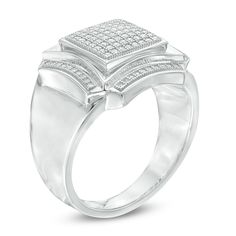 This contemporary diamond fashion ring is a mesmerizing look. Crafted in sterling silver, this bold style features a squared composite of shimmering diamonds bordered with curved ribbons of diamonds. The stepped shank lends interest to the design. Radiant with 1/3 ct. t.w. of diamonds, this comfort-fit ring is finished with a polished shine. Custom-made to fit his ring size. Sterling silver rings cannot be resized after purchase. Modern Cluster Ring With Diamond Accents, Modern Signet Ring With Diamond Accents For Promise, Modern Silver Diamond Ring With Pave Setting, Modern White Gold Signet Ring With Diamond Accents, Modern Silver Diamond Signet Ring, Modern White Diamond Signet Ring, Modern Rectangular Diamond Ring For Anniversary, Modern Diamond White Diamond Ring With Pave Setting, Modern Diamond White Ring With Pave Setting