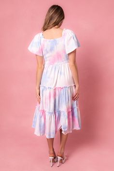 This magical dress is packed with the most whimsical details --- a flowy skirt, super soft 100% cotton, smocked bodice, and a subtle square neck-line that doesn't sacrifice coverage. Perfect for gender reveals, parties and just because. Cute Tiered Dress With Smocked Back, Flowy Smocked Dress With Bodice And Square Neck, Flowy Smocked Dress With Square Neck And Smocked Bodice, Playful Vacation Dress With Smocked Back, Playful Dress With Smocked Back For Vacation, Spring Smock Dress With Square Neck, Flowy Smock Dress With Square Neck, Playful Pink Dress With Smocked Back, Cute Cotton Tiered Dress