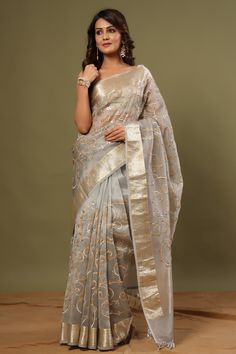 Buy grey gota work organza sari online in USA with zari work. Make a fashion statement at weddings with stunning designer sarees, embroidered sarees with blouse, wedding sarees, handloom sarees from Pure Elegance Indian fashion store in USA.-full view Gray Saree With Zari Work For Wedding, Silver Chanderi Saree For Wedding, Diwali Gray Dupatta With Traditional Drape, Festive Gray Dupatta With Resham Embroidery, Gray Traditional Wear With Zari Work For Diwali, Gray Saree With Dupatta For Wedding, Festive Silver Saree With Sheer Dupatta, Silver Saree For Reception And Festivals, Gray Wedding Saree With Dupatta