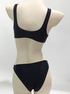 Elevate your beach look with our Jetsetter Cut Out One Piece Swimsuit Monokini. Featuring a sultry Hollow Out design, this swimsuit will have you feeling confident and sexy while lounging by the pool or taking a dip in the ocean. Perfect for the stylish and adventurous jetsetter. Material: Polyester Black Swimwear With Built-in Bra For Beachwear, Black Swimwear With Built-in Bra, Chic Solid Swimwear For Beach Season, Chic Black Swimwear For Beach, Chic Solid Color Swimwear For Beach Season, Chic Swimwear With Built-in Bra, Black Triangle Top Swimwear For Summer, Chic Black Swimwear For Vacation, Chic Solid Swimwear With Built-in Bra