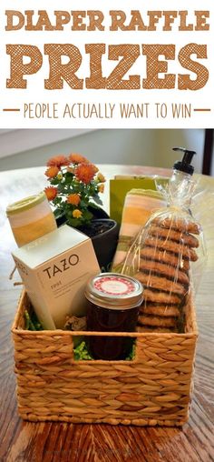 the diaper raffle prize basket with honey, jams and cookies in it