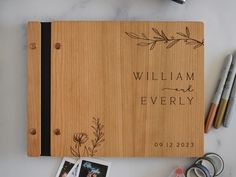 Minimalist bamboo wedding guest book in an cherry wood finish with engraved, customized couples names and a boho leaf design on the cover. Keepsake Display, Graduation Guest Book, Photo Album Wedding, Wooden Wedding Guest Book, Flair Pens, Photo Polaroid, Wooden Guest Book, Album Wedding, Wedding Guest Books