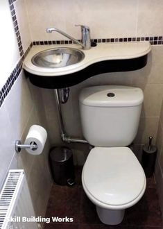 a toilet and sink in a small bathroom