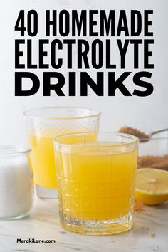 two glasses filled with lemonade next to some sugar and an orange on the table