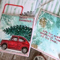 three christmas cards, one with a red car and the other has a tree on it