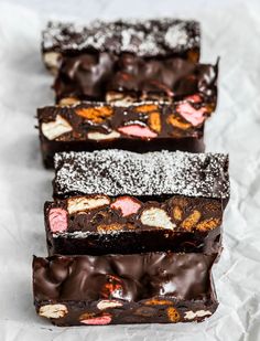 four pieces of chocolate and marshmallow candy bars