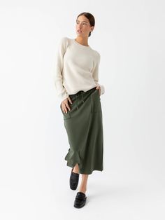 Comfort meets class in our first women’s skirt made from the same softness of our Women’s Ultra-Soft Jogger. Featuring two knee-length slits to offer free-flowing, feminine flair and a dreamy brushed finish, this season-less midi skirt offers endless styling options to look effortlessly elegant in less time. A drawstring stretch waist enhances comfort while patch pockets give your essentials a place to stay. DETAILS: Ultra soft brushed fabric 62% Premium Viscose from Bamboo, 28% Acrylic, 10% Spa Relaxed Maxi Skirt With Elastic Waistband For Loungewear, Casual Relaxed Viscose Maxi Skirt, Casual Viscose Maxi Skirt With Relaxed Fit, Casual Flowy Viscose Maxi Skirt, Flowy Midi Skirt For Loungewear, Flowy Long Skirt For Loungewear, Casual Skirt With Side Slits, Relaxed Fit Midi Skirt For Loungewear, Relaxed Midi Skirt For Loungewear