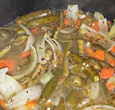 the vegetables are being cooked in the pot