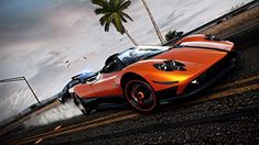 an orange sports car driving down a road next to a palm tree and ocean in the background