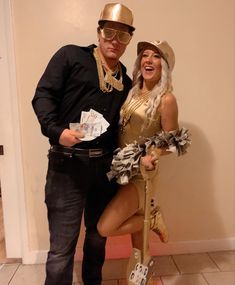 a man and woman dressed up in costumes