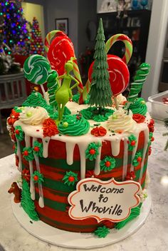 a decorated christmas cake sitting on top of a counter