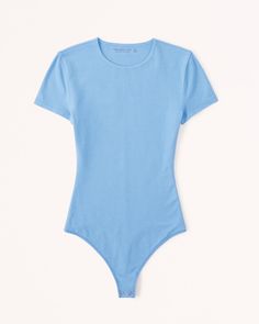 Slim-fitting short-sleeve bodysuit in our softAF cotton seamless fabric, featuring crew neckline and two-snap bottom closure. Our cotton seamless fabric is an ultra soft, brushed jersey fabric, that gives you a casual seamless look! Spring Cotton Stretch Short Sleeve Bodysuit, Spring Short Sleeve Basic Bodysuit, Casual Short Sleeve Bodysuit With Relaxed Fit For Summer, Casual Fitted Short Sleeve Cotton Bodysuit, Casual Cotton Fitted Short Sleeve Bodysuit, Casual Cotton Short Sleeve Fitted Bodysuit, Cotton Short Sleeve Bodysuit For Summer, Cotton Short Sleeve Bodysuit, Blue Fitted Cotton Short Sleeve Bodysuit