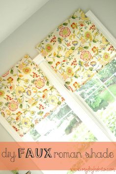 an image of roman shades with flowers on them