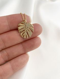 "--NATURE COLLECTION-- This dainty gold monstera leaf necklace is perfect for casual, special occasions or date night. Makes a great gift for Best Friends, Birthdays, Mother's Day, Wedding, Anniversary or any occasion. Choose between 6 beautiful necklace pendants representing the graceful beauty of nature. 1. Tiny Sparkly Bee (12mm x 12mm) 2. Dainty Butterfly (12mm x 10mm) 3. Golden Dandelion (10mm x 16mm) 4. Golden Cactus (9mm x 18mm) 5. Tiny Daisy (11mm x 11mm) 6. Dainty Monstera (16mm x 19mm) Gold Plated Leaf-shaped Jewelry For Gifts, Gold Leaf Nature-inspired Jewelry, Gold Leaf-shaped Jewelry For Jewelry Making, Gold Bohemian Leaf-shaped Jewelry, Bohemian Gold Leaf-shaped Jewelry, Nature-inspired Gold Leaf-shaped Jewelry, Gold Leaf-shaped Nature-inspired Necklace, Nature-inspired Gold Leaf Necklace, Bohemian Gold Leaf Jewelry