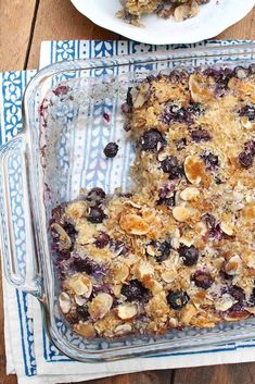 blueberry crumbled oatmeal breakfast casserole in a glass dish