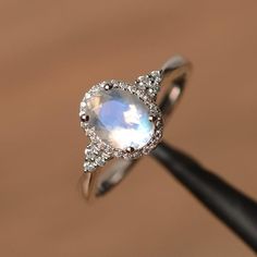 natural moonstone ring oval cut wedding engagement ring sterling silver ring June birthstone No Diamond Engagement Ring, Moonstone Ring Vintage, Realistic Wedding, Engagement Ring Silver, Elegant Rings, 15 Birthday, June Birthstone Ring, Moonstone Engagement, Wedding Rings Halo