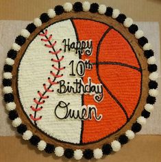 a birthday cake decorated with an image of a basketball ball and the words happy 10th birthday queen