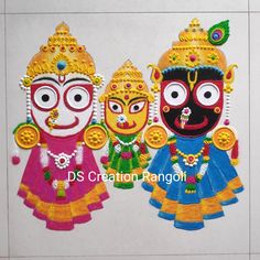 three colorfully decorated puppets are standing next to each other in front of a white wall