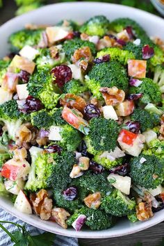 a bowl filled with broccoli and other vegetables