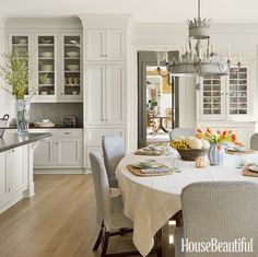 the kitchen is clean and ready to be used for dinner or breakfast time, as well as other things in the dining room