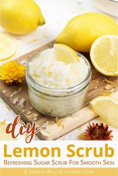 lemon scrub in a small glass bowl on a cutting board next to sliced lemons