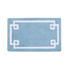 a blue rug with white squares and square shapes on the front, along with an outline of a rectangle in the middle